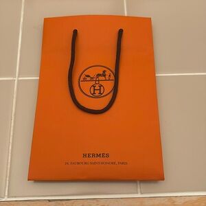 Hermes small shopping bag with ribbon/ receipt holder